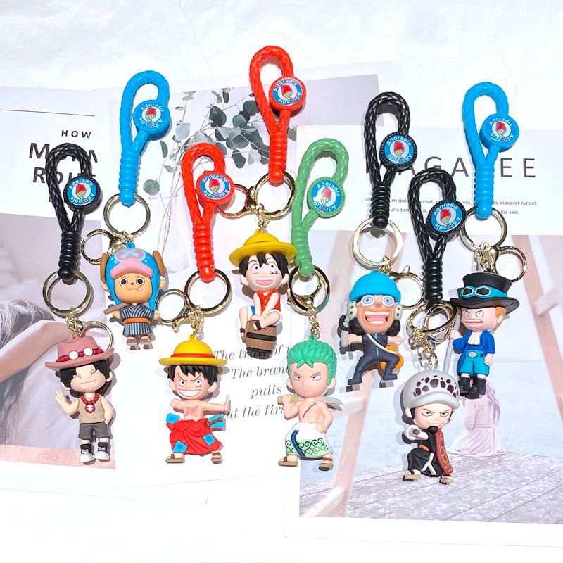 Sef of 8pcs Creative Pirate keychain cartoon personalized school bag pendant car chain male and female doll small gift 6th generation One Piece keychain